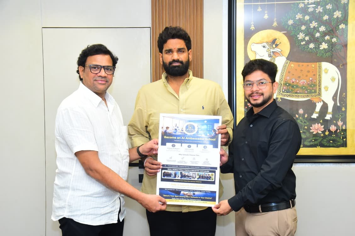 BrovAI representatives holding an AI Ambassador School poster